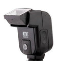 SLR camera flash accessory with tilt head shown at 90-degree angle for bounce flash