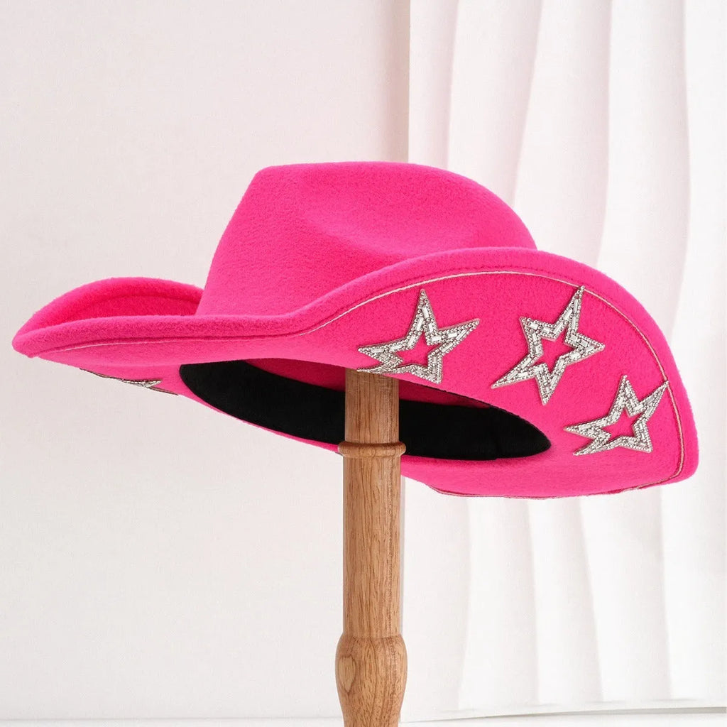 Beige woolen felt Western top hat with a conical crown and a decorative hexagonal star on the front.
