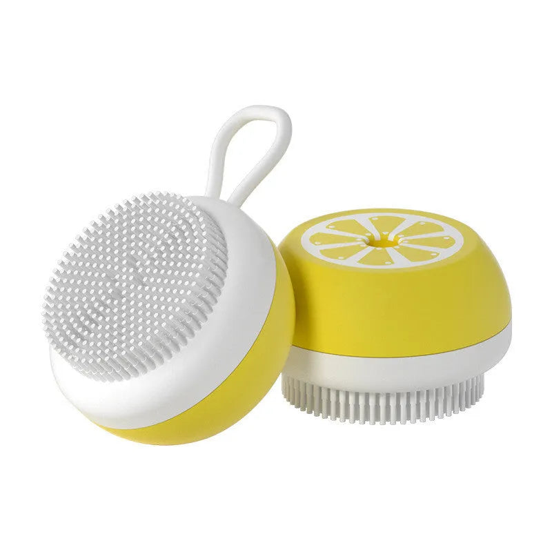 Yellow silicone pet bath brush with massage heads and combed bristles for washing dogs or cats.