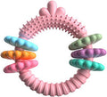 Blue TPR rubber dog chew ring toy with squeaker for small dogs on a white background