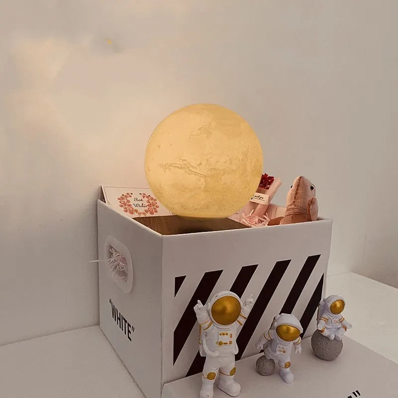Maglev moon planet night light with floating elements and astronaut figurines