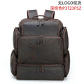 Dark brown genuine leather men's backpack open to show 17-inch laptop compartment and internal organiser pockets.