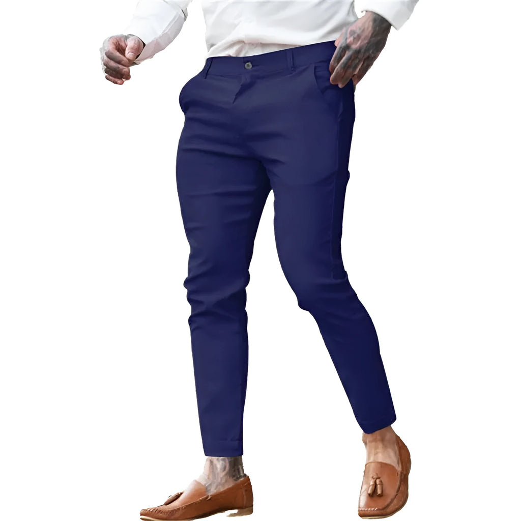 Men's slim fit pencil pants in twill cotton stretch fabric shown in a solid colour.
