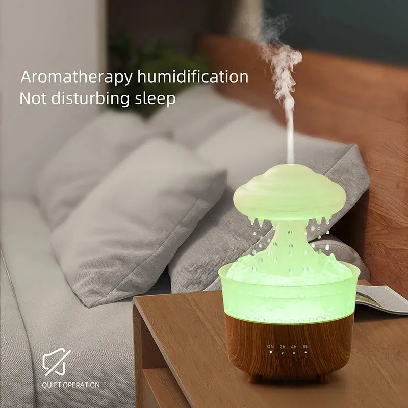 Wood grain white column-shaped rain cloud humidifier diffuser with LED night light on a table.