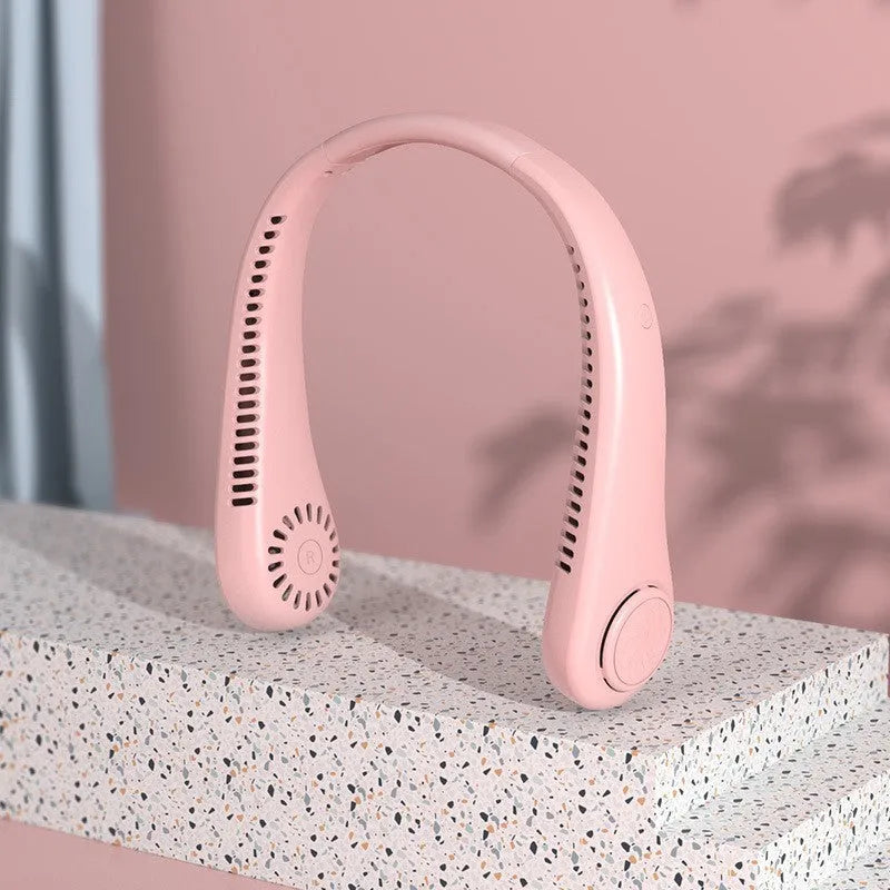 Blue coloured USB rechargeable portable bladeless neck fan being worn.