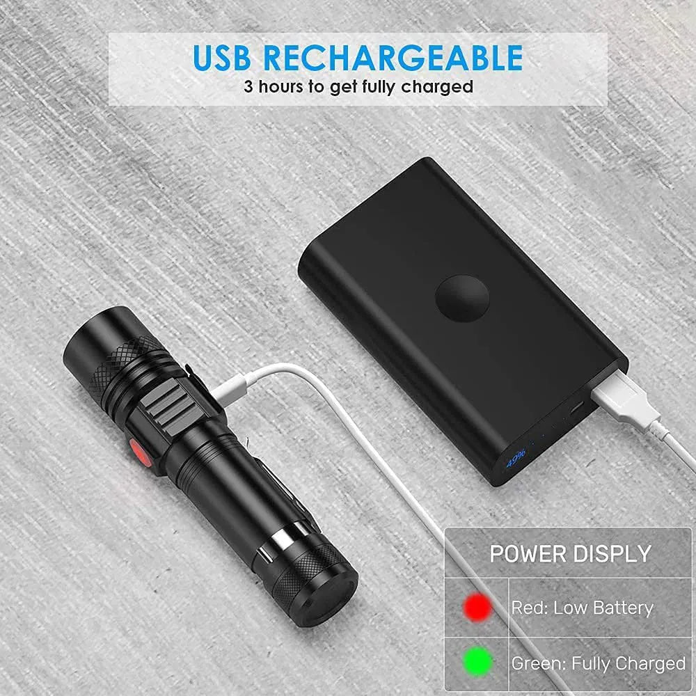 Black telescopic zoom USB rechargeable T6 LED flashlight on outdoor background