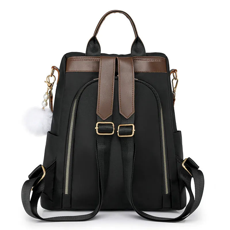 Colour block large capacity anti-theft backpack in beige with oxford cloth exterior and three-dimensional front pocket