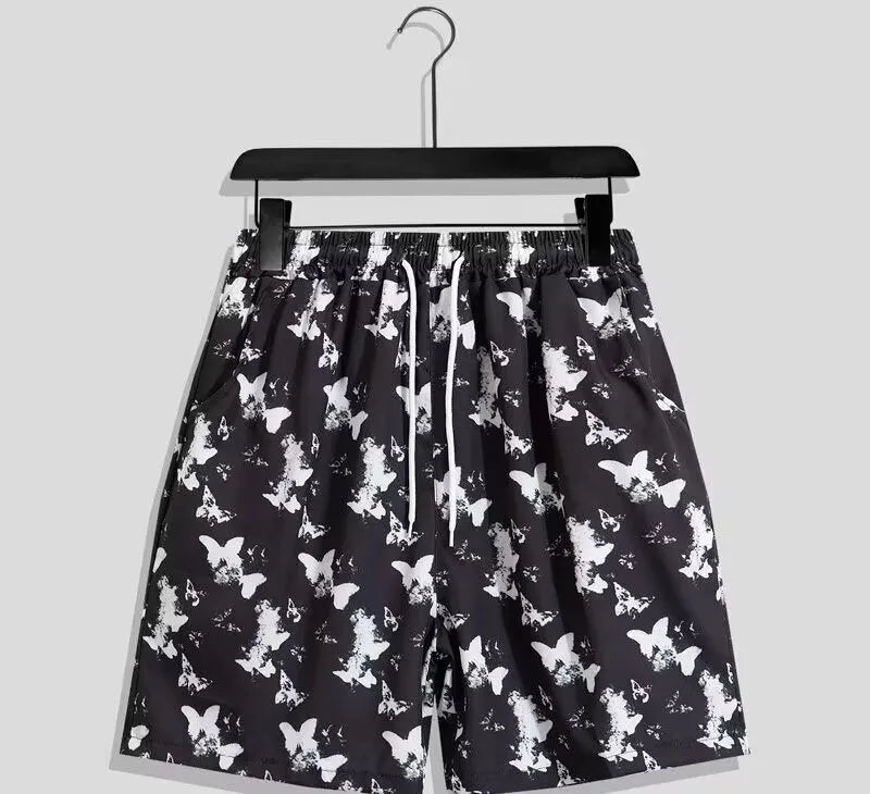 Men's casual geometric printed quick-drying polyester shorts in loose fit, mid waist, drawstring closure