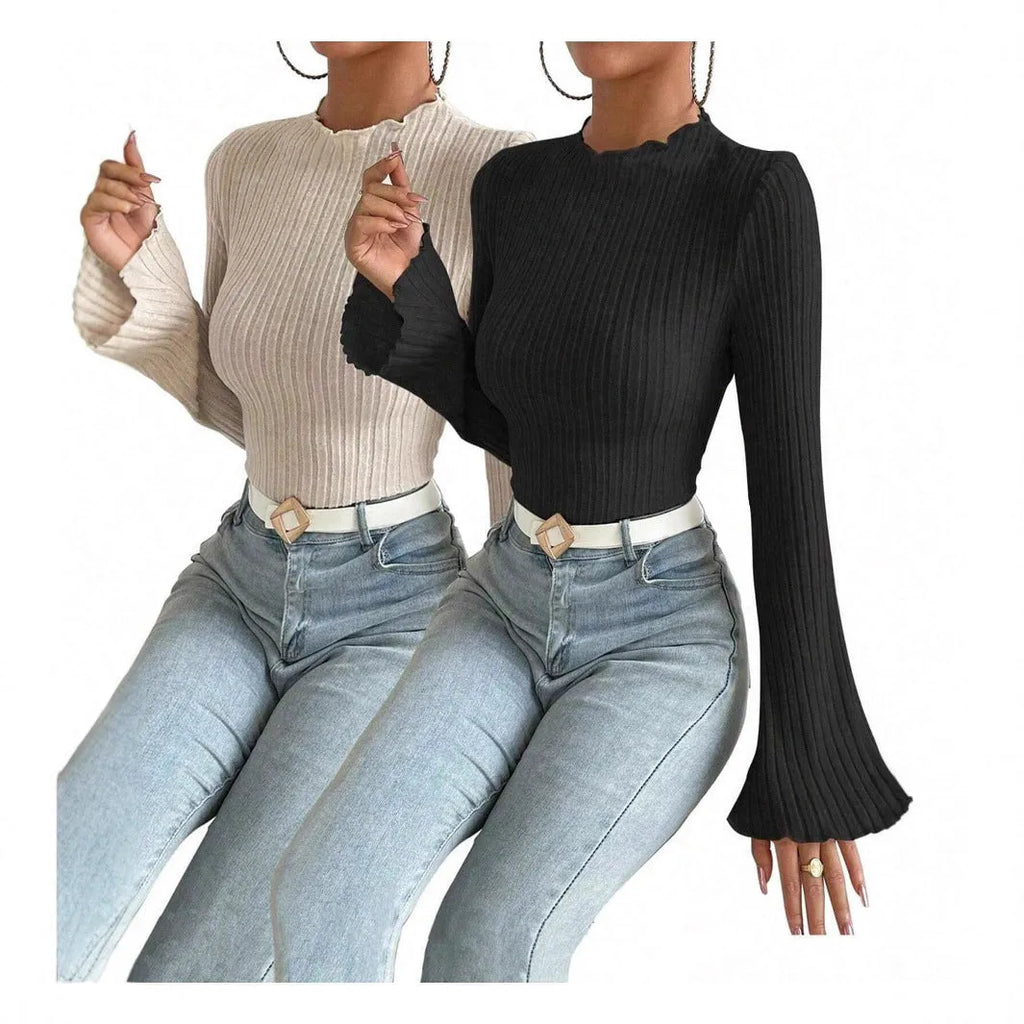 A black long sleeve round neck top with lantern sleeves and a slim fit, showcasing a brushed polyester fabric.