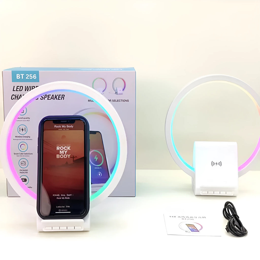 White smart Bluetooth speaker with wireless charging pad and ambient light ring
