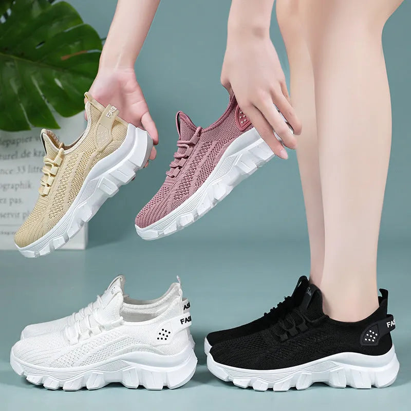 Women's Flyknit sneakers with thick PVC sole in beige colour showing lace-up front and round toe design