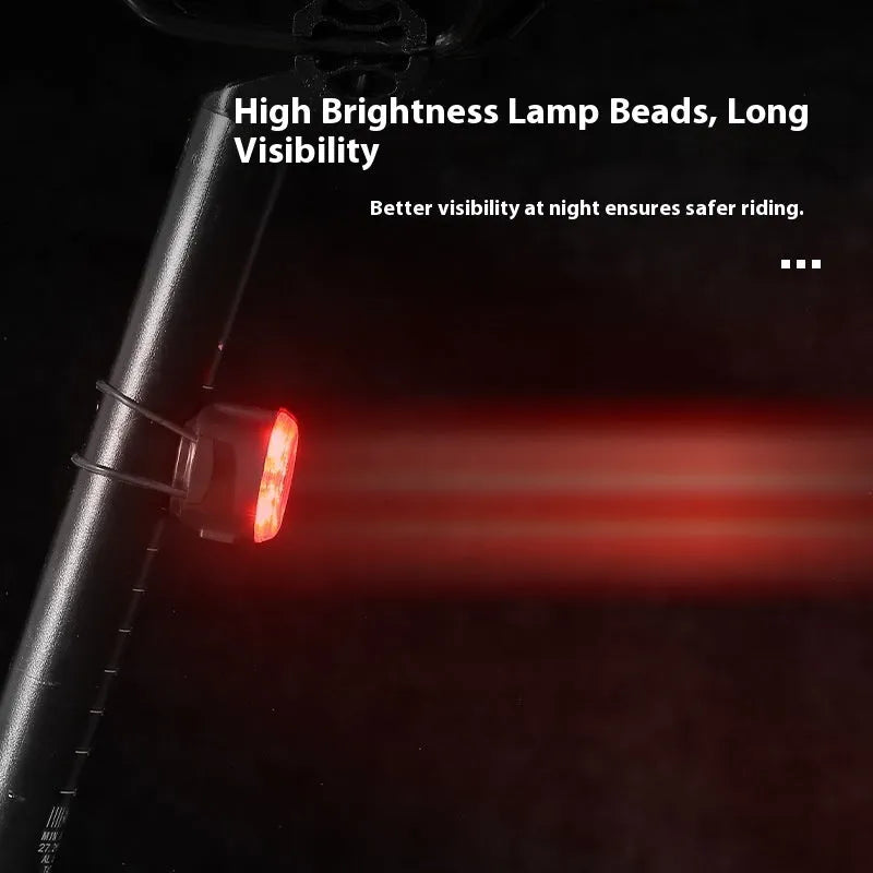 Round red bike warning light with silicone straps and USB cable for night riding