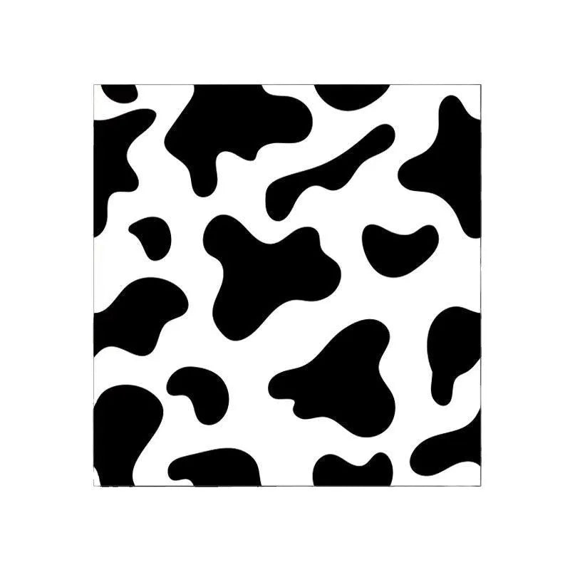 Colourful cartoon animal print nylon cosmetic bag in large, medium, and small sizes.