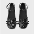 Women's black genuine leather retro pumps with buckle fastening and low square heel