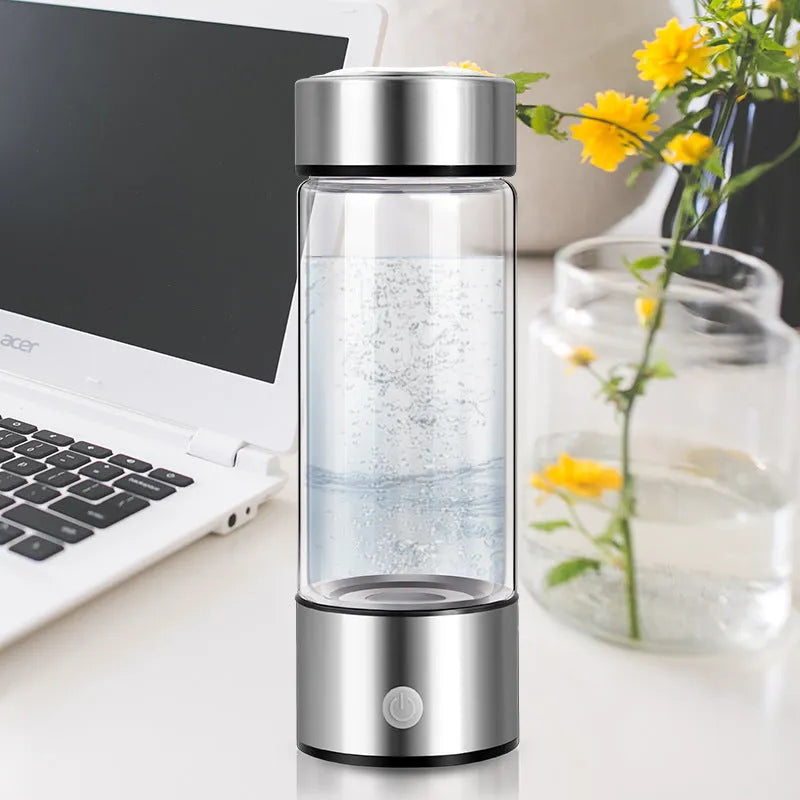 Silver hydrogen water bottle with electric generator and borosilicate glass construction