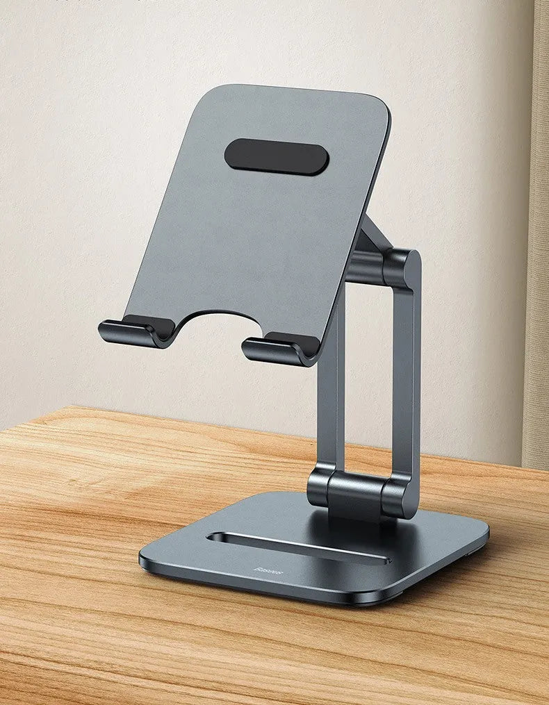 Deep space grey aluminium folding stand holding a tablet next to its compact folded size.