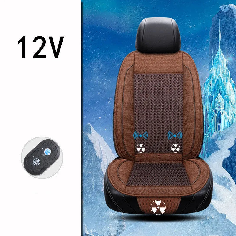 Black car ventilation seat cushion with power cord on car seat measuring 60 by 60 centimetres