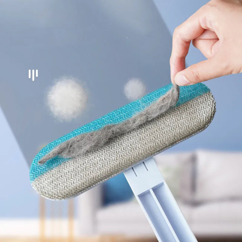 Multifunctional plastic cleaning brush with soft flannel head and extension handle for pet hair and dust.