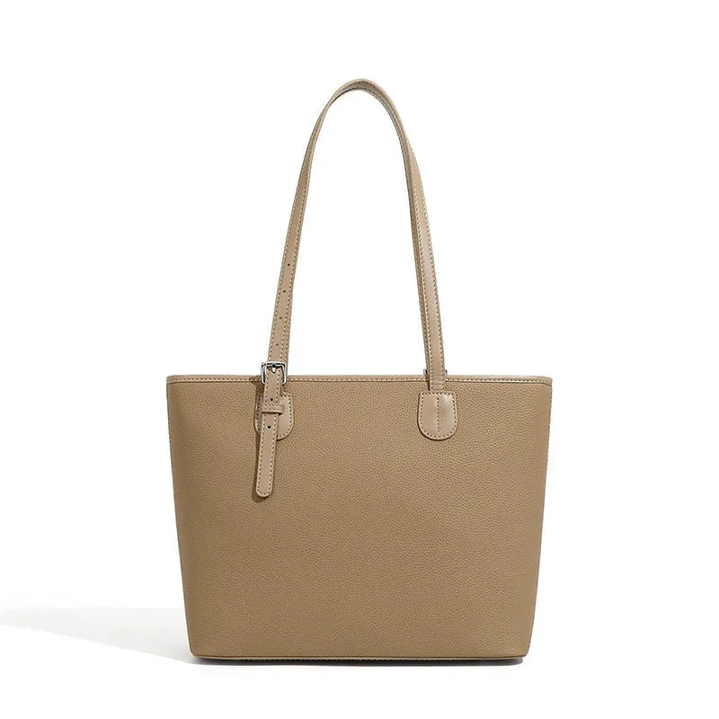 Genuine leather retro women's tote bag in horizontal square shape, showing internal zipper and phone pockets.