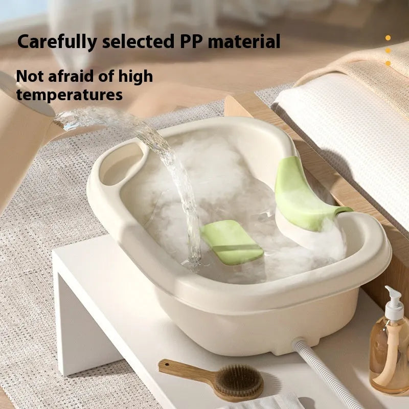 Portable shampoo basin set with circulating water pump and cushioned head support in light pink