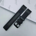 A canvas watch strap made from Oxford cloth in camouflage colour, showing the textured fabric and standard lug ends.