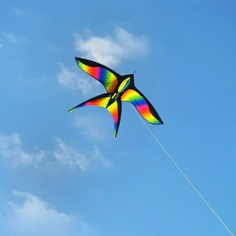 Creative Home 45cm gradient rainbow swallow kite on a checked cloth surface with thread board beside it