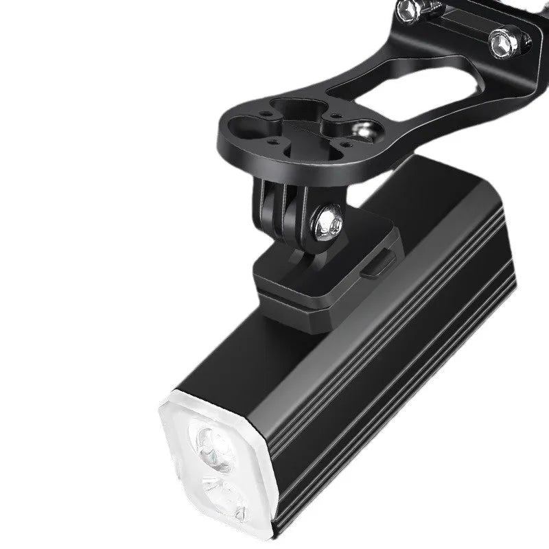 Aluminium alloy bicycle headlight with silicone mount on handlebars showing 400 lumen output