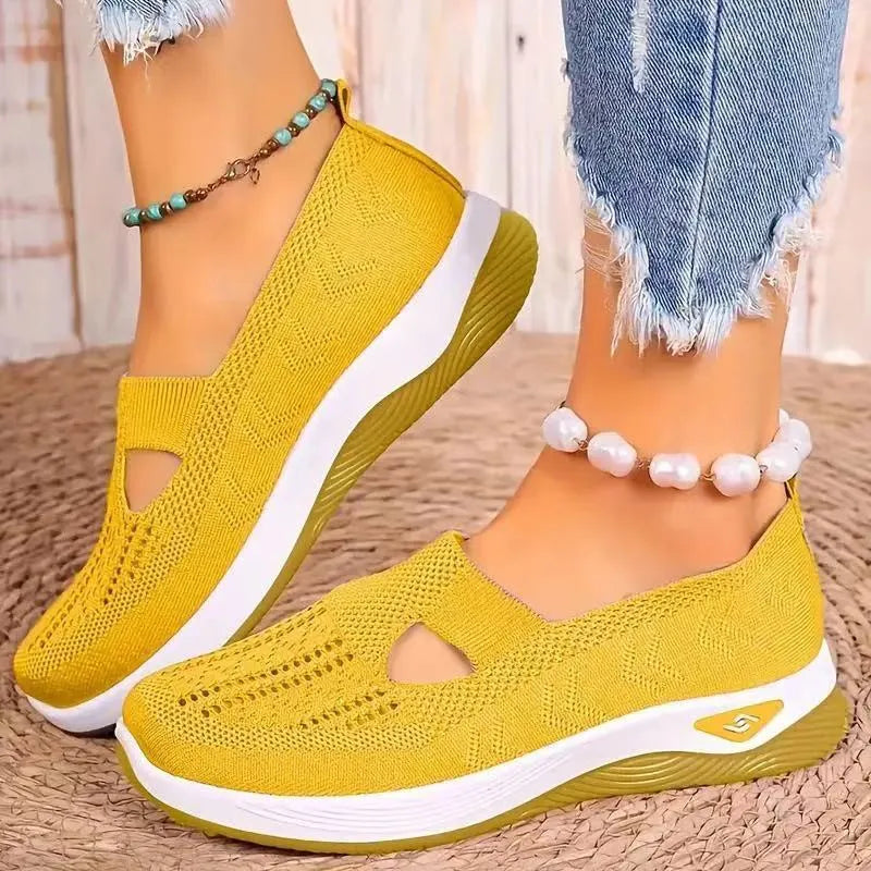 Women's casual mesh shoes with a T-strap and soft PVC sole in multiple colours.