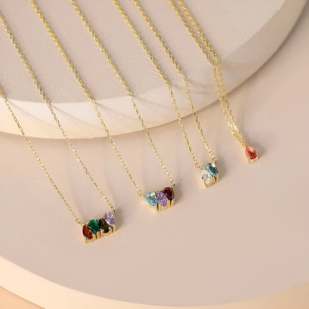 Zircon stone clavicle chain necklace in electroplated titanium steel with birth month style options.