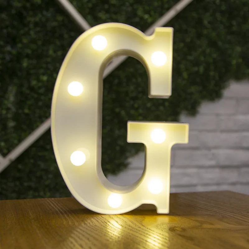 White plastic LED marquee letter sign with warm white glow, 22cm tall