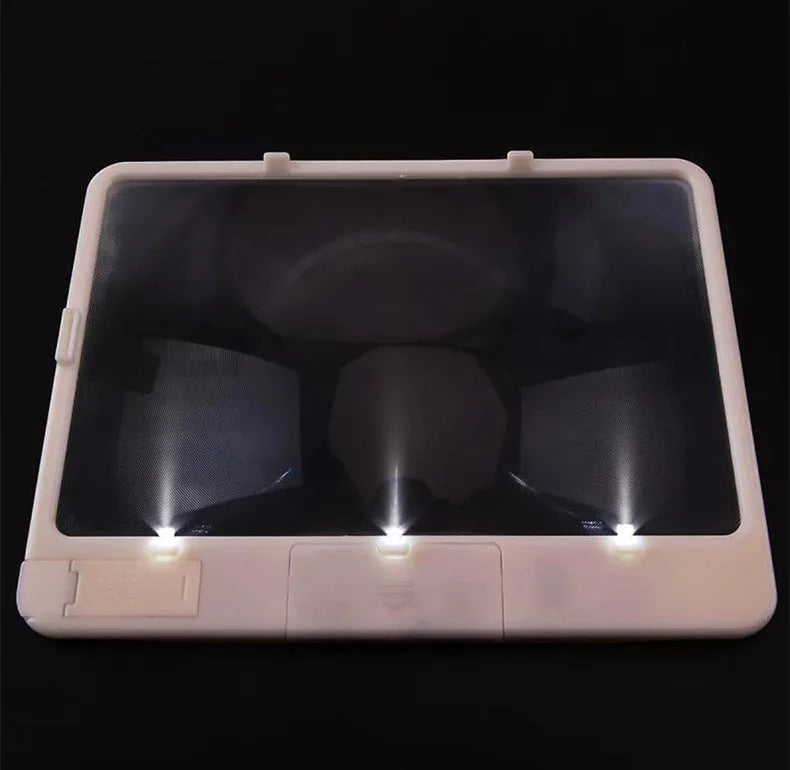 A black magnifying glass with a built-in LED light, showing 3x magnification and dimensions of 180mm by 140mm.