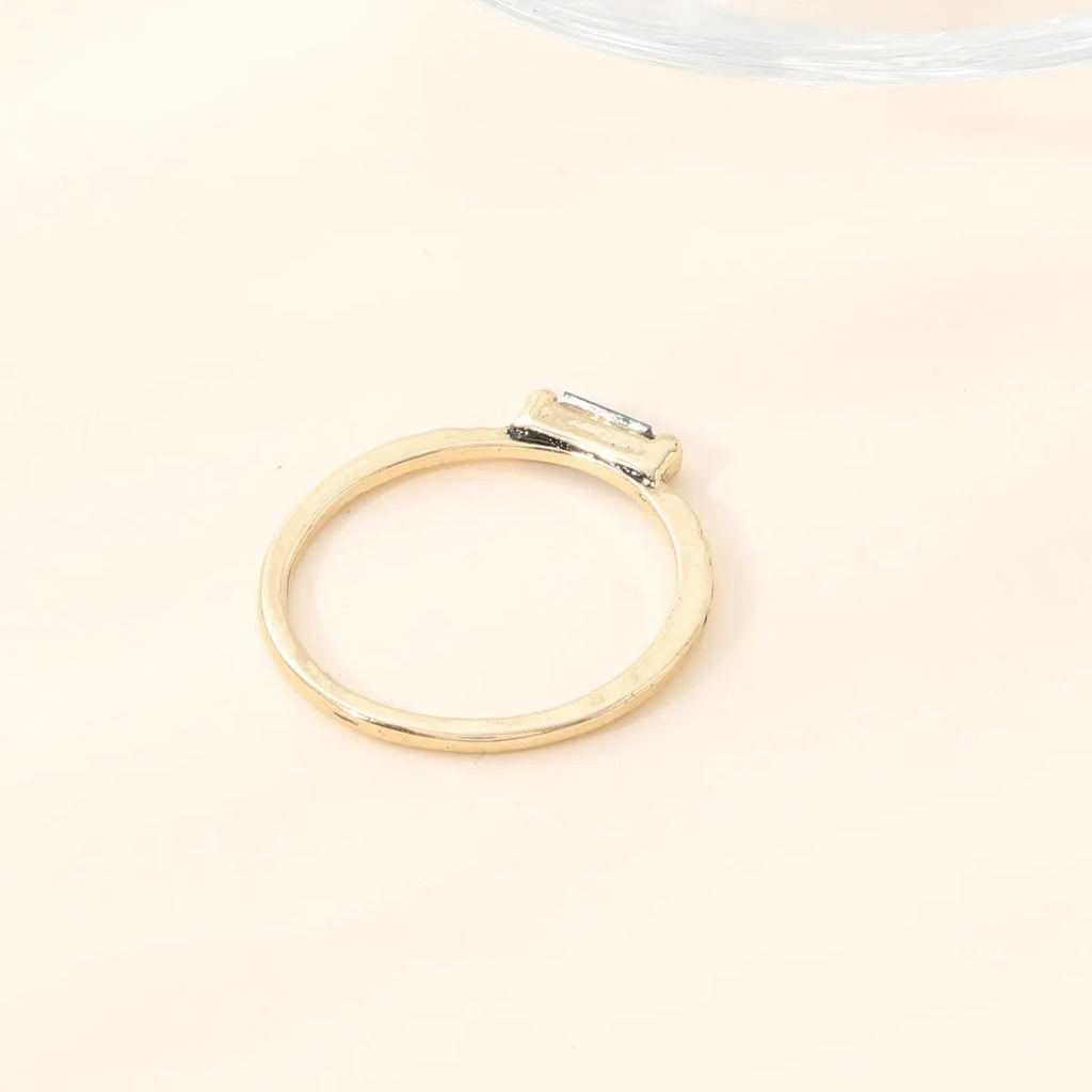 18K gold electroplated ring with square white cubic zirconia stone on geometric zinc alloy band, unisex sizing No 6-10