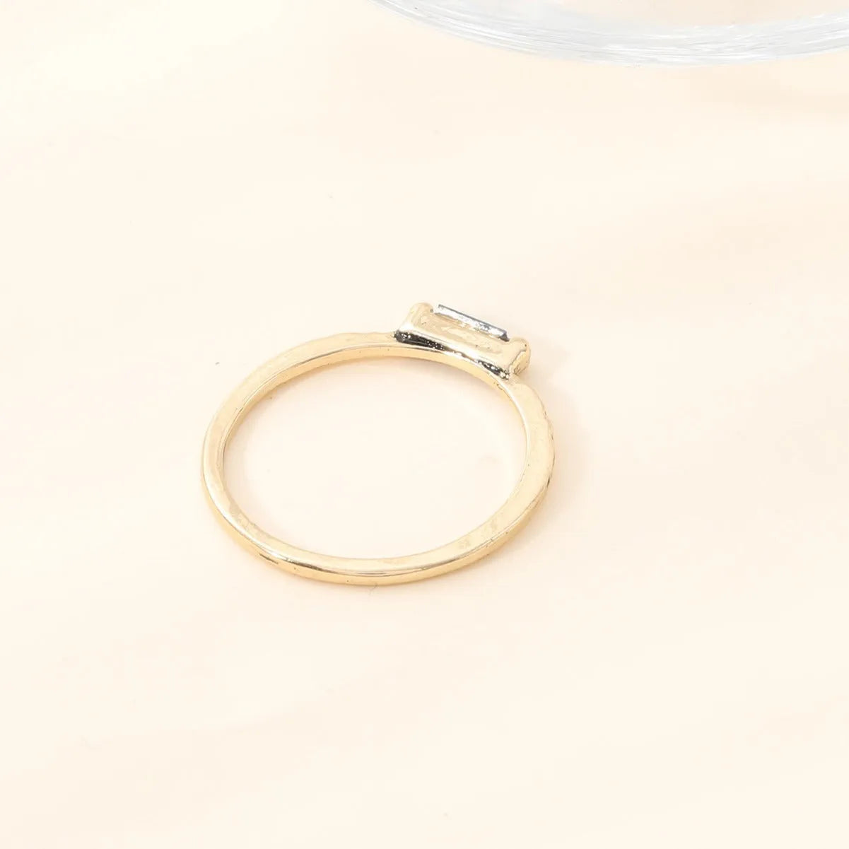 18K gold electroplated ring with square white cubic zirconia stone on geometric zinc alloy band, unisex sizing No 6-10