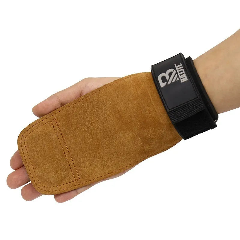 Brown neoprene wrist protector with a wide adjustable strap, shown on a wrist next to a pull-up bar.