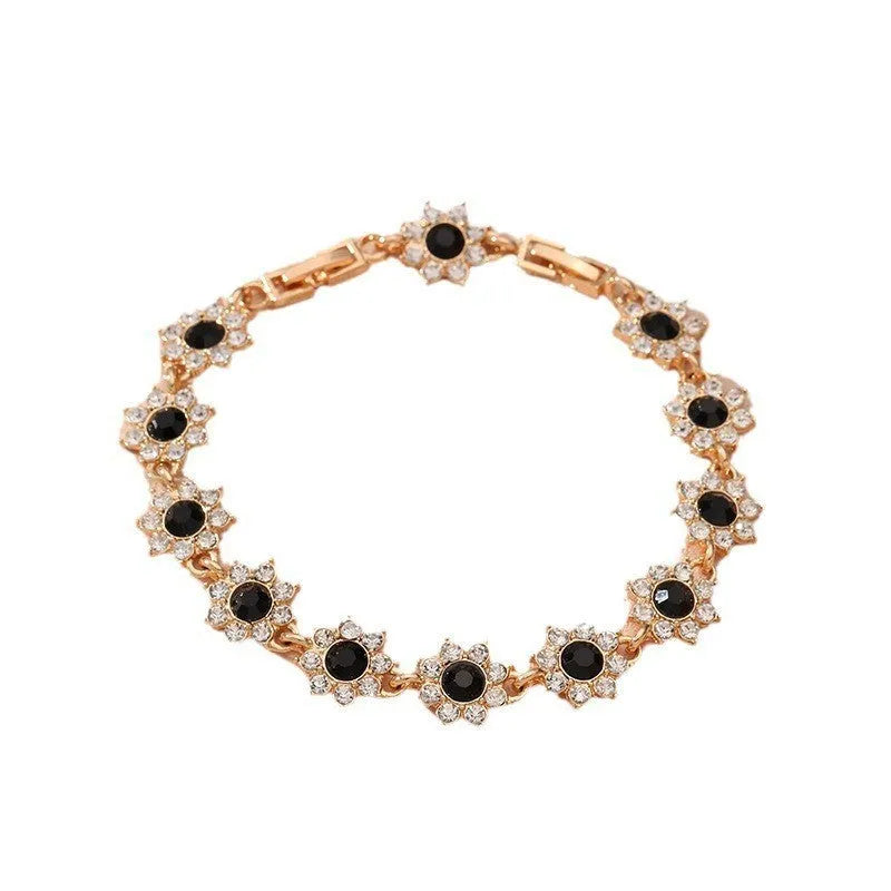 Zinc alloy electroplated flower bracelet with colourful crystal designs on wrist