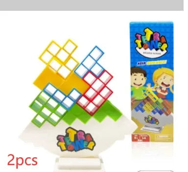 Plastic balance stacking board game with 16 coloured blocks, chassis, and base on a 26.5cm square box.