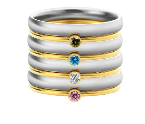 December birthstone ring with engraved geometric pattern and gold electroplated finish on titanium steel band.