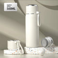 316 stainless steel insulated thermos cup with tea and water separation, in army green, 500ml capacity, on a white background