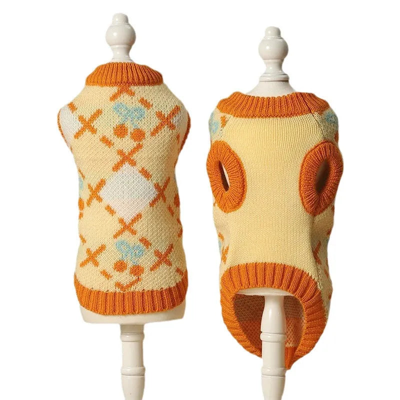 Orange diamond knit cat jumper showing chest measurement points and size labels