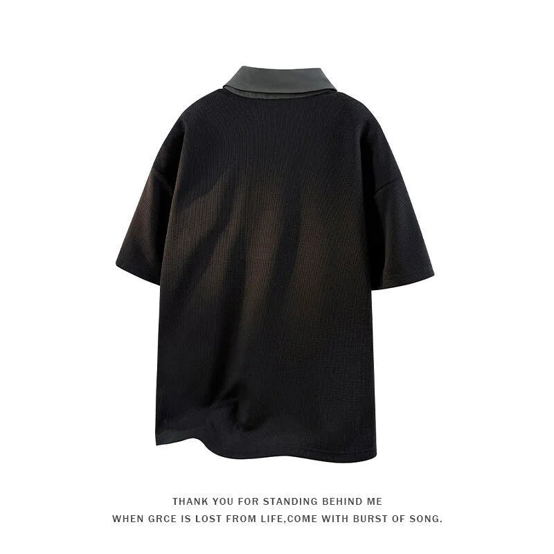 Men's thin black polo shirt sweater with a Henry collar and short sleeves.