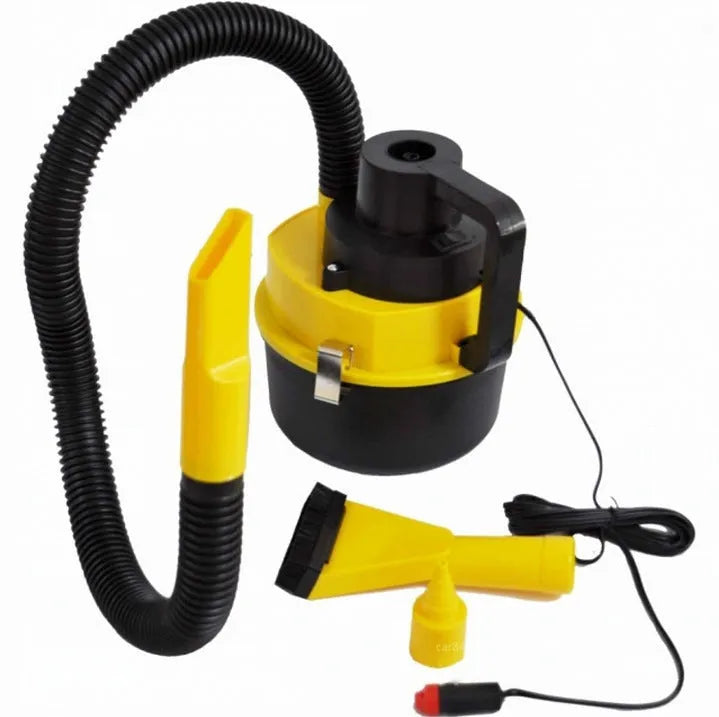 Yellow 12V wet and dry car cleaner with ABS body on a grey surface with nozzles and hose visible