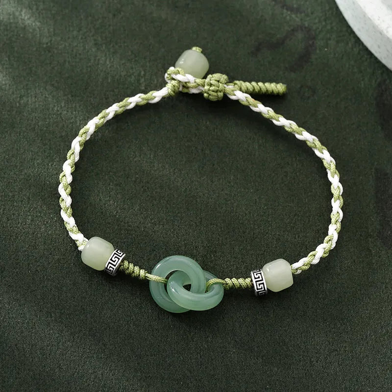 Green jade and copper ethnic bracelet with peace buckle centrepiece and double ring design