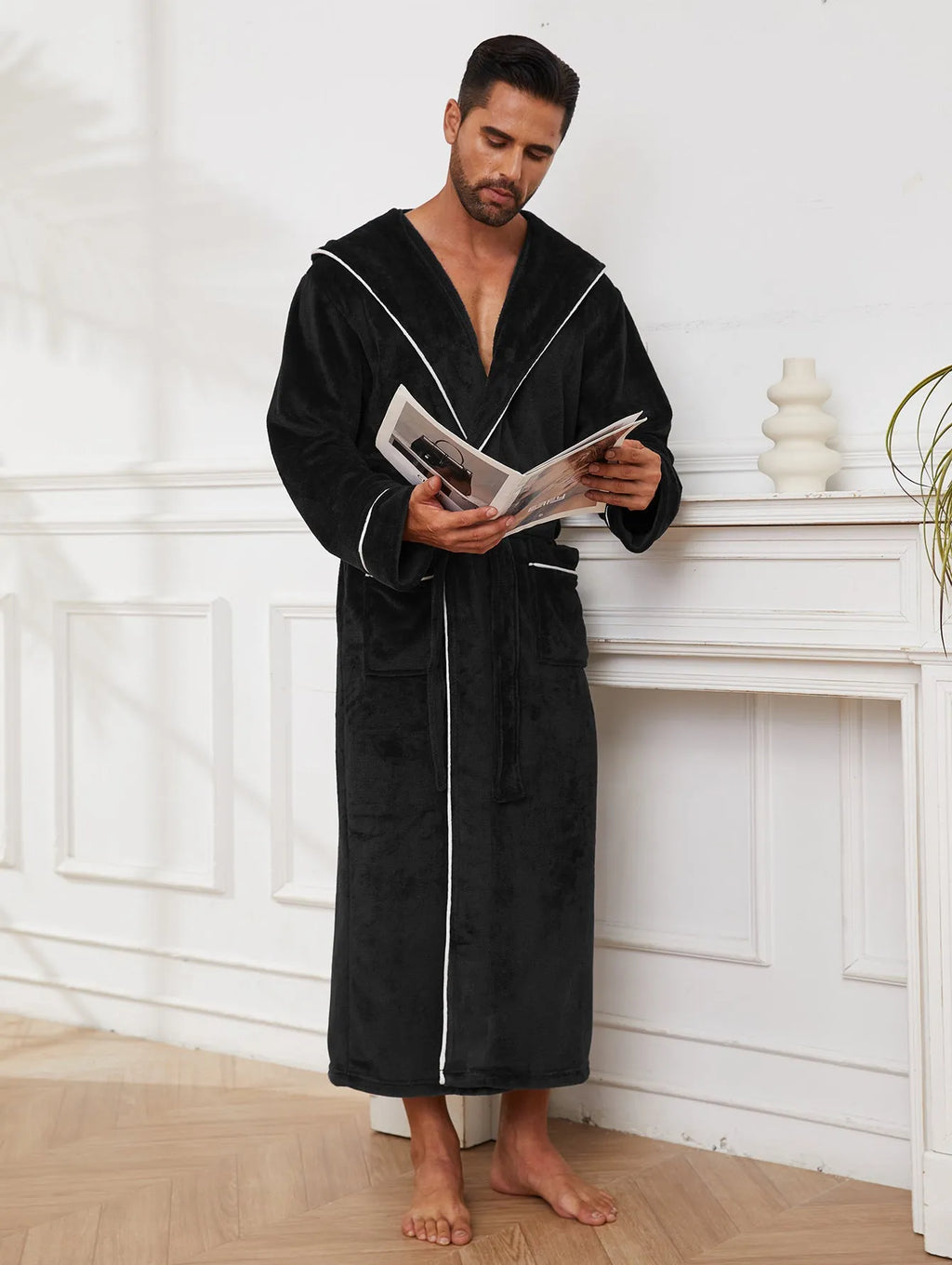 Man wearing a light grey flannel bathrobe in a European style for winter.