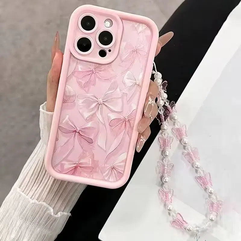 Pink silicone phone case with custom Tianyan ladder pattern and bow detail, compatible with Apple iPhone models