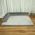 Corduroy dog sofa bed with non-slip base in grey colour, showing bilateral bolster design