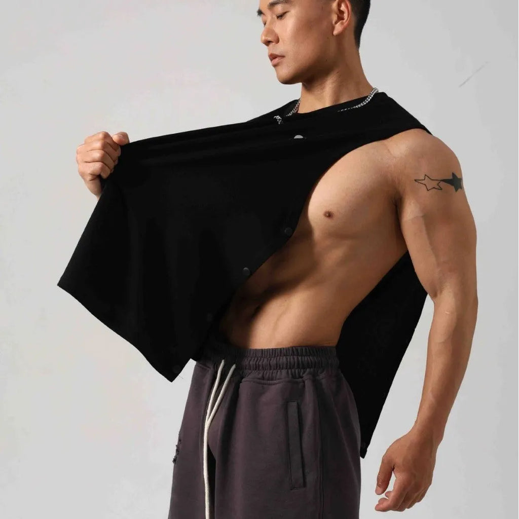 Male model wearing a solid colour loose fit cotton fitness vest with hidden side hooks.