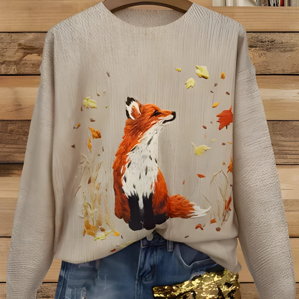 Man wearing a loose fit digital printed long sleeve top with a lapel collar.