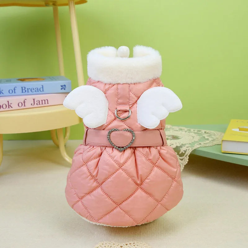 Small dog wearing pink thickened cotton skirt with casual angel-style design