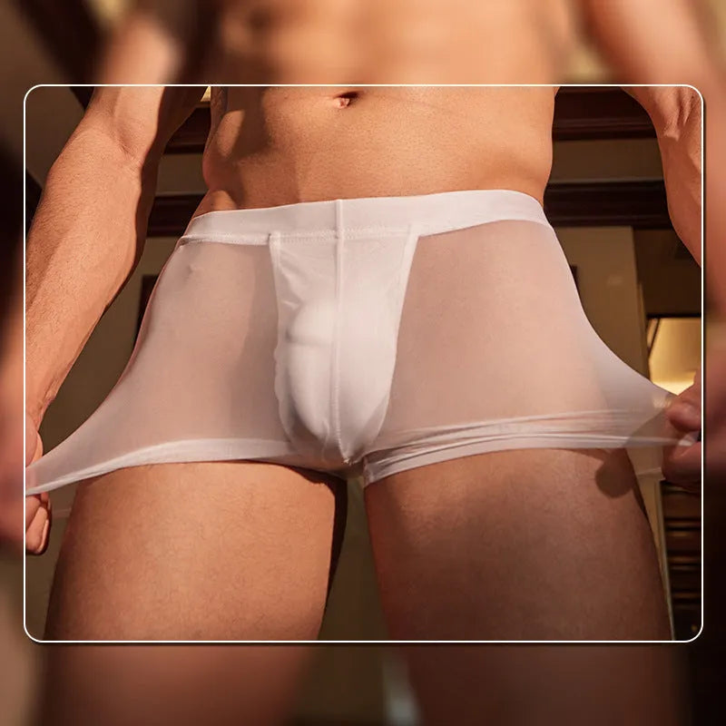 A pair of men's black ultra-thin nylon boxer briefs laid flat.