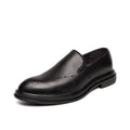 Big size men's slip-on loafers with pointed toe, black artificial PU upper and PU sole side view